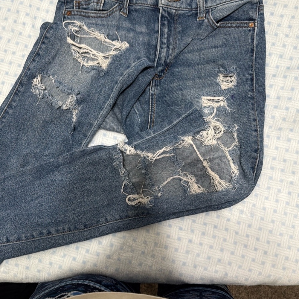 Distressed Blue Jeans